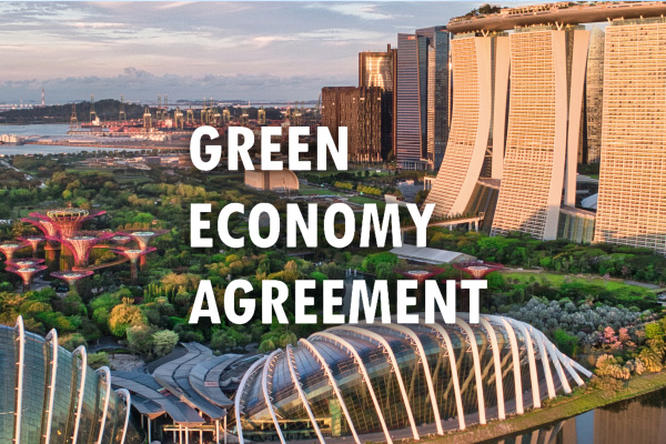 Green Economy Agreement text over Gardens by the Bay and Marina Bay Sands.